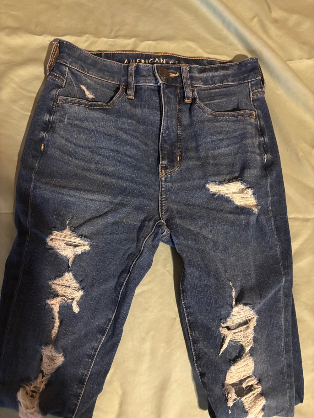 American Eagle Outfitters Women's Ripped super-high rise jeans